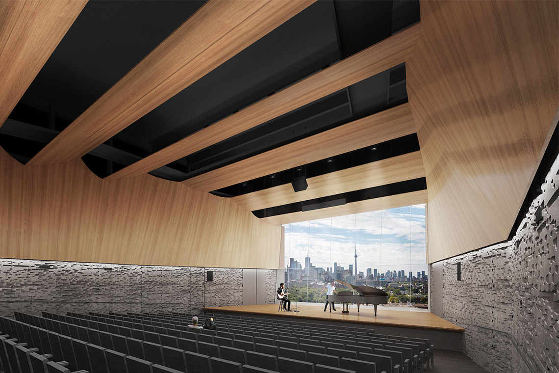 The wood-panelled music recital hall features a large window and exposed beams overhead
