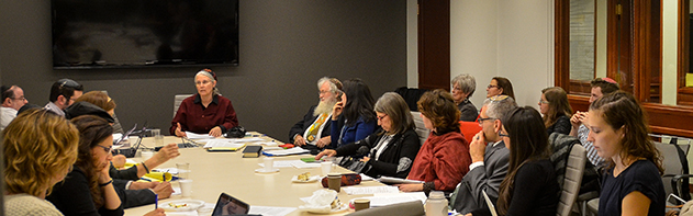 Attendees gather around the table at the Jewish Family event