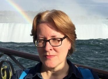 Professor Heather D. Baker in front of the Niagara Falls